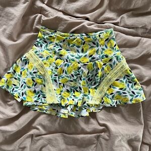 lemon pleats and thank you tennis skort